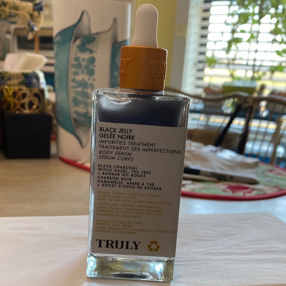 TRULY Black Jelly Body Serum - Black Bottle with White Label and Gold Dropper
